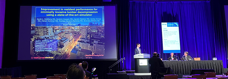 Dr. Goldberg presents his award-winning paper at Spine Summit 2022