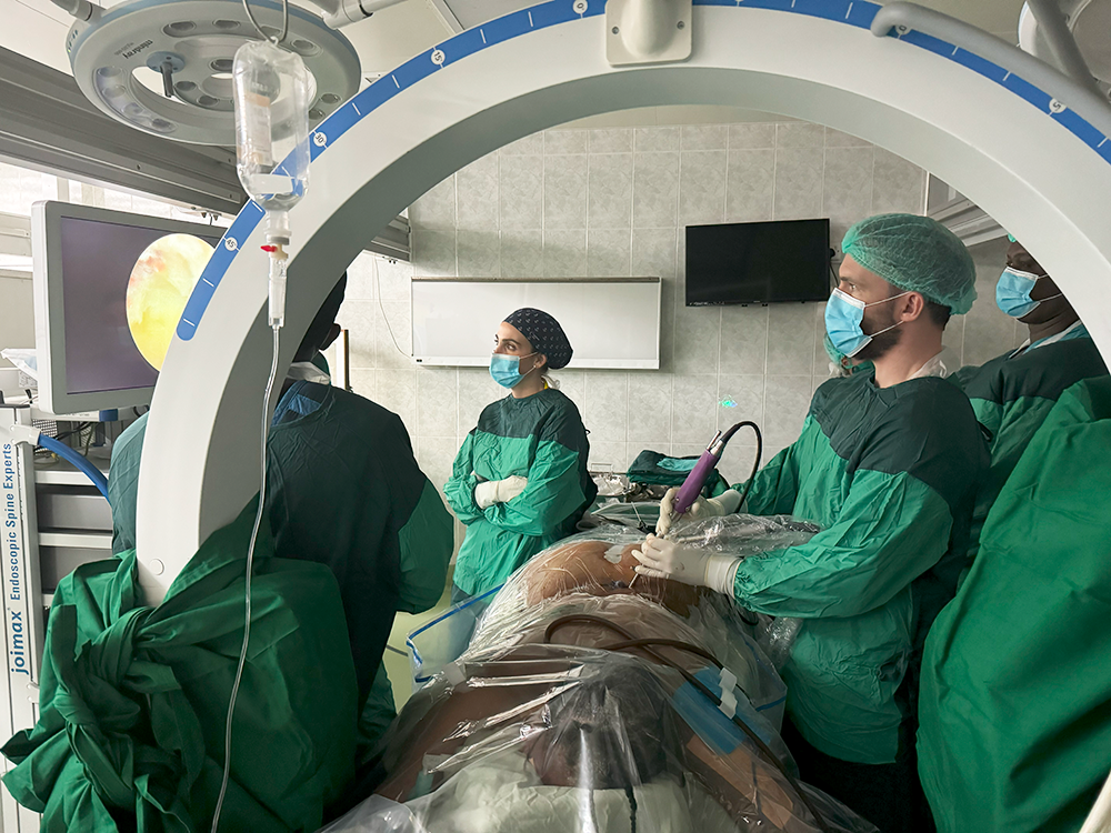 Dr. McGrath leads an endoscopic spine procedure in Tanzania