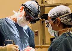 Dr. Schwarz in the operating room with Dr.Larsen